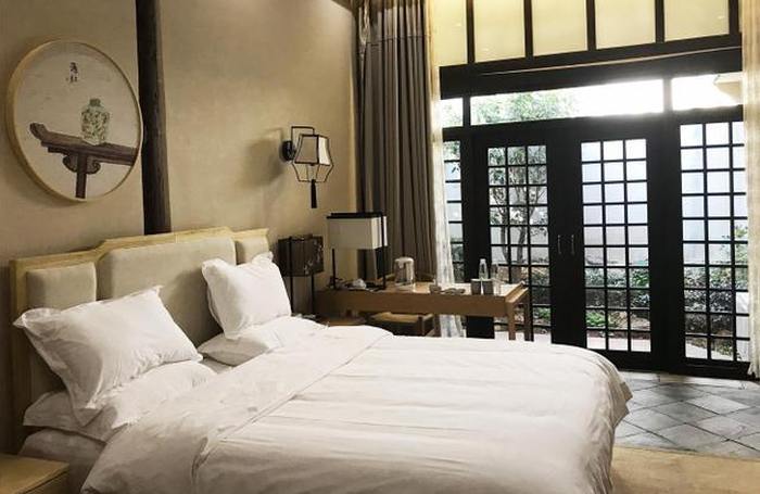 Schlafzimmer, Yuanshe Dong Cheng Wai Guesthouse, Jianshui, China Rundreise