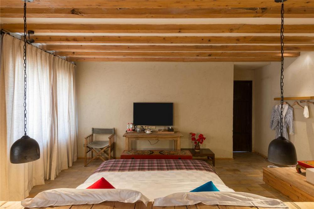 Schlafzimmer, Blossom Hill Inn Shangri-La, China Rundreise